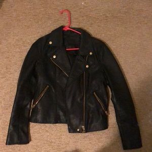 Hardly worn leather jacket with gold detail